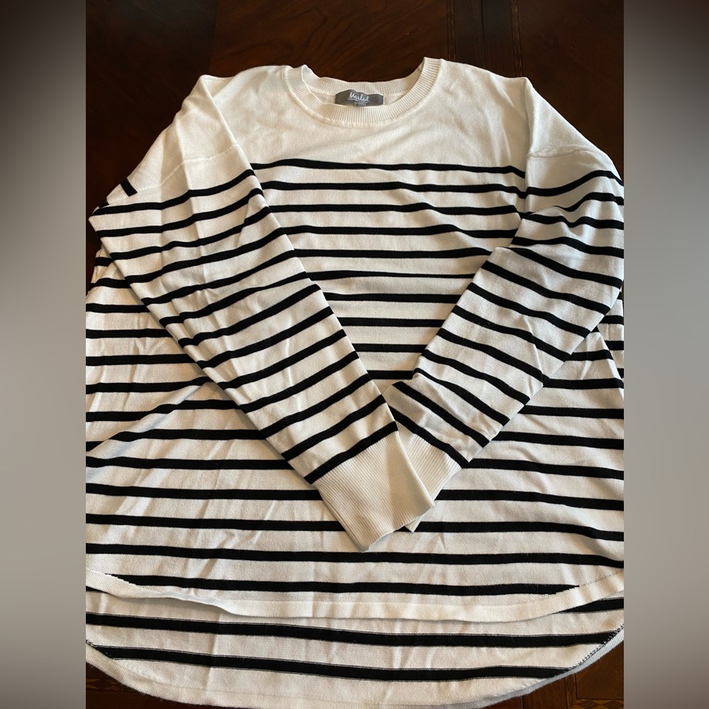 Striped rounded edge sweater